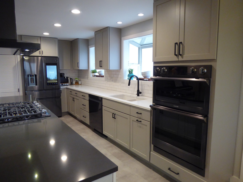 Example of a transitional kitchen design in Seattle