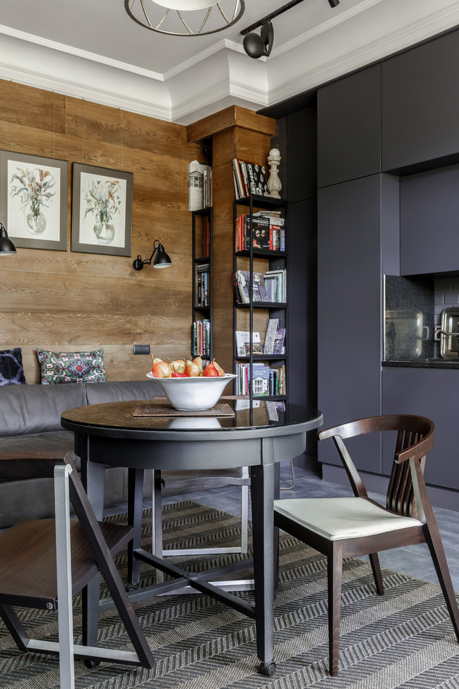 Contemporary open plan dining with brown walls, porcelain floors and grey floor.