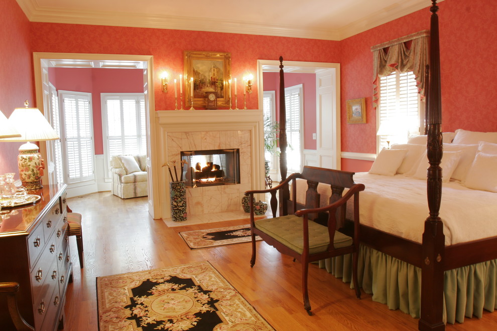 Inspiration for a traditional bedroom in Atlanta with a two-sided fireplace.