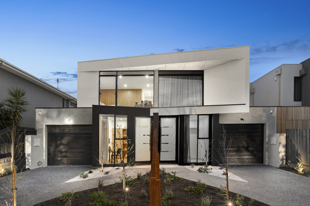 This is an example of a contemporary two-storey multi-coloured duplex exterior in Melbourne with a shed roof.