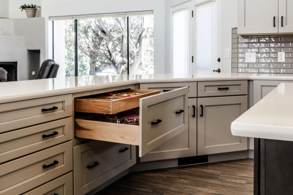 Inspiration for a large transitional u-shaped vinyl floor and gray floor eat-in kitchen remodel with an undermount sink, shaker cabinets, gray cabinets, quartzite countertops, green backsplash, subway tile backsplash, stainless steel appliances, an island and white countertops
