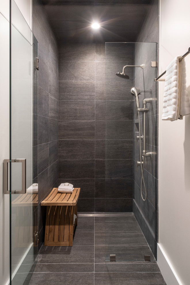 Design ideas for a small contemporary master bathroom in Los Angeles with shaker cabinets, medium wood cabinets, a curbless shower, gray tile, porcelain tile, beige walls, an undermount sink, engineered quartz benchtops, grey floor, a hinged shower door, white benchtops and porcelain floors.
