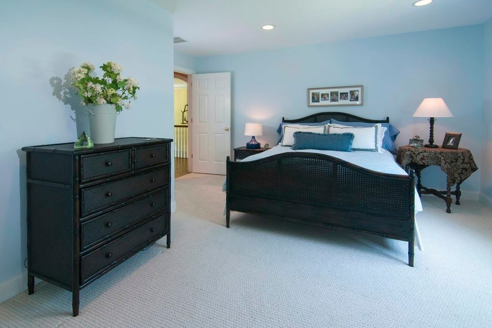 Mid-sized contemporary guest bedroom in Philadelphia with blue walls, carpet and no fireplace.