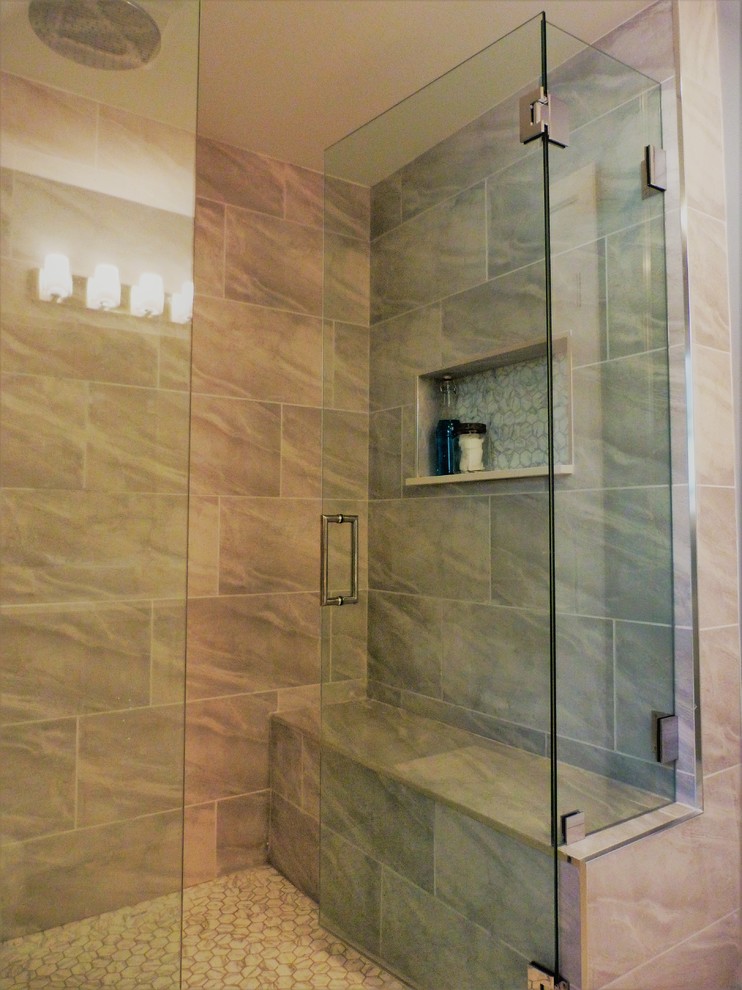 This is an example of a mid-sized contemporary master bathroom in Vancouver with flat-panel cabinets, white cabinets, a curbless shower, gray tile, ceramic tile, grey walls, mosaic tile floors, engineered quartz benchtops, grey floor and a hinged shower door.