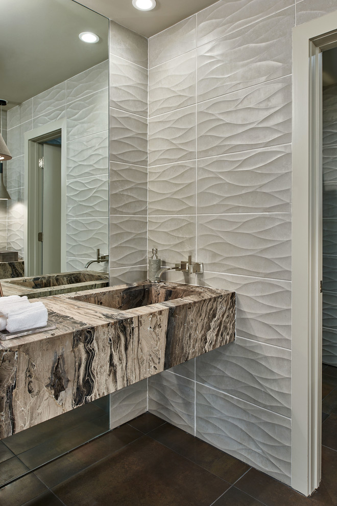 Bathroom - mid-sized contemporary gray tile and porcelain tile bathroom idea in Houston with an integrated sink and brown countertops
