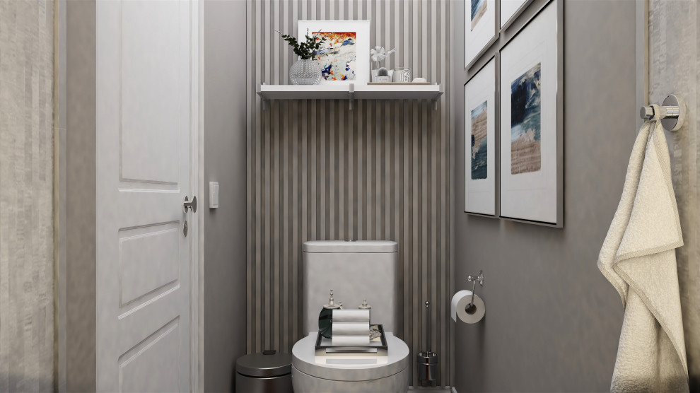 Cette image montre un petit WC et toilettes minimaliste avec un placard à porte plane, des portes de placard grises, WC à poser, un mur gris, parquet foncé, un lavabo posé, un plan de toilette en quartz, un sol marron, un plan de toilette blanc, meuble-lavabo suspendu et du lambris.