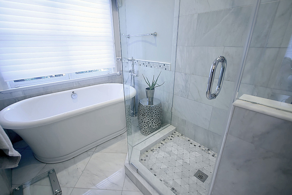 Small traditional ensuite bathroom in Charlotte with flat-panel cabinets, beige cabinets, a freestanding bath, beige tiles, marble tiles, marble flooring and engineered stone worktops.