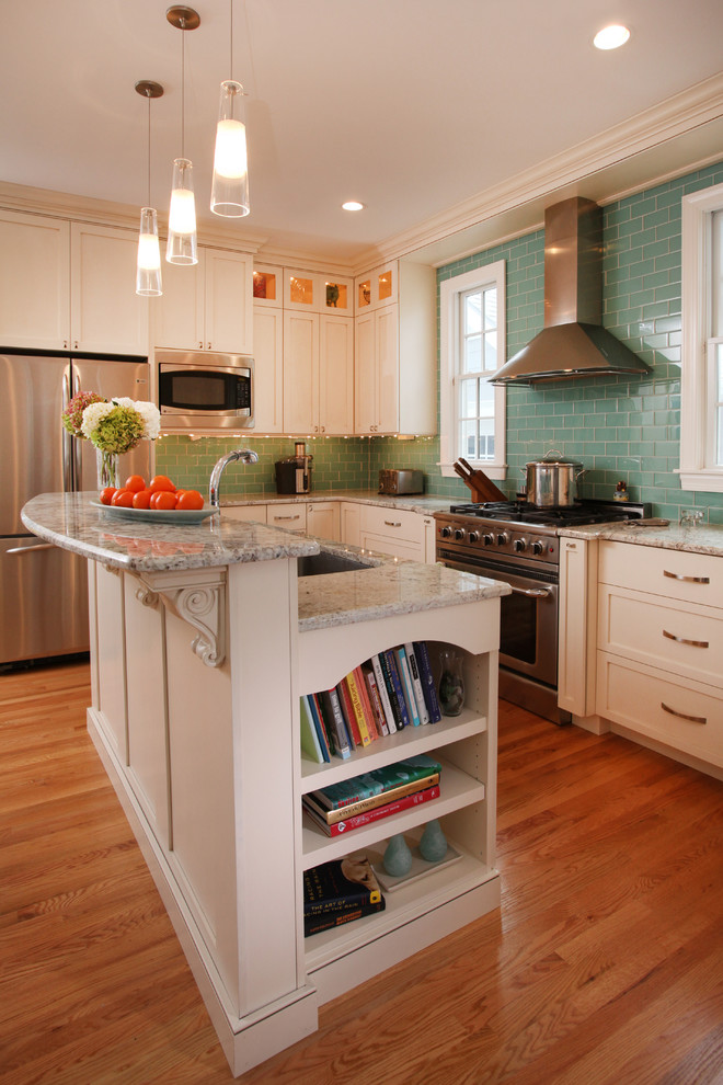Contemporary kitchen in Philadelphia with subway tile splashback and stainless steel appliances.