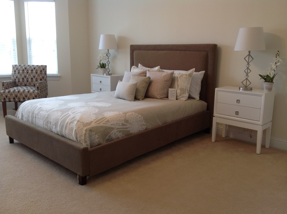 Inspiration for a transitional master bedroom in St Louis with beige walls, carpet, no fireplace and brown floor.