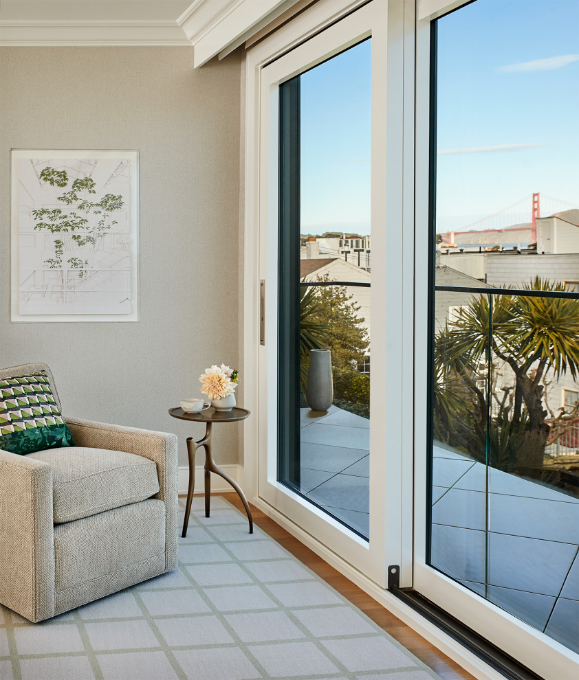 Photo of a medium sized contemporary master bedroom in San Francisco with beige walls and no fireplace.