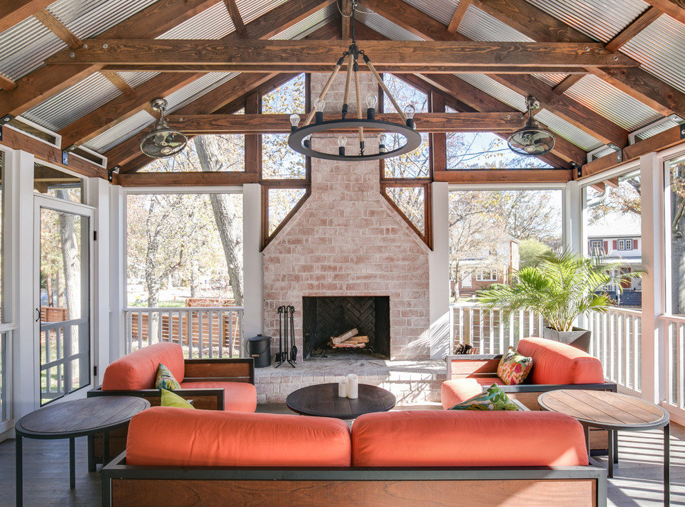 Inspiration for a transitional screened-in verandah in DC Metro with a roof extension.