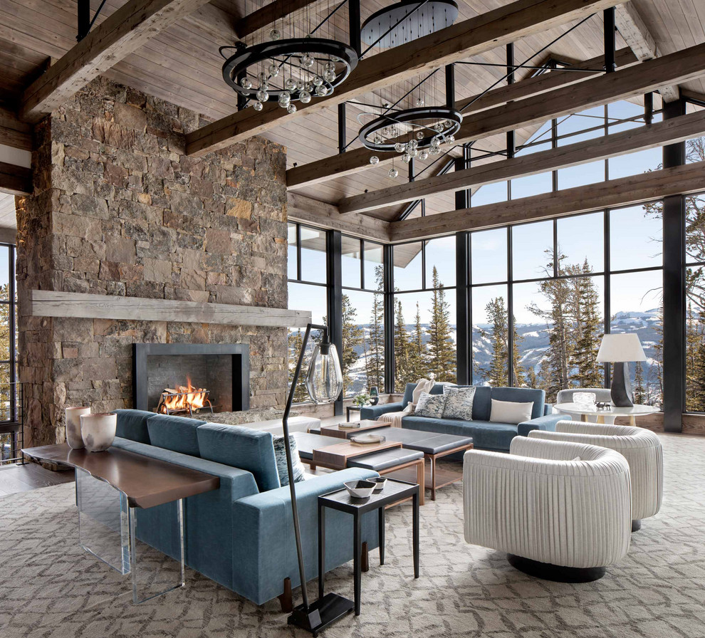 Rustic living room in Other with a standard fireplace and a vaulted ceiling.