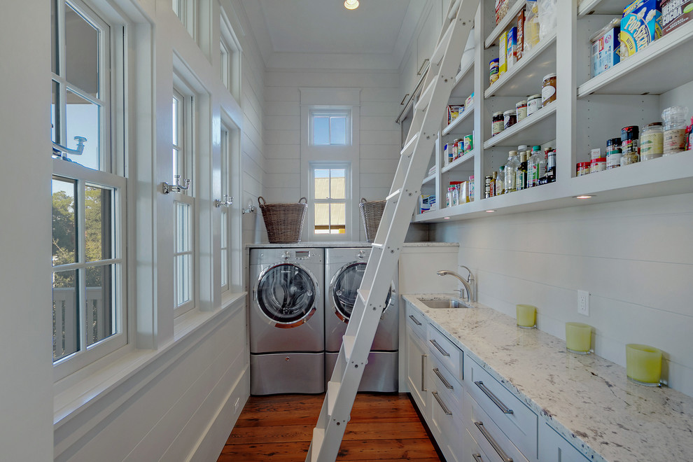 Design ideas for a beach style laundry room in Miami.