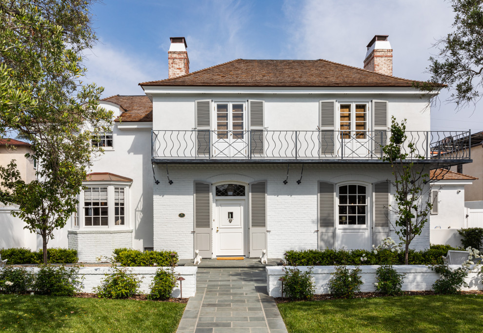 Inspiration for a large traditional house exterior in San Diego.