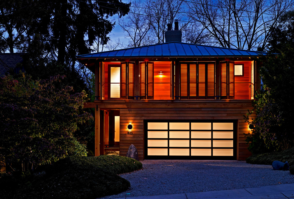 Inspiration for a contemporary exterior in Detroit with wood siding.