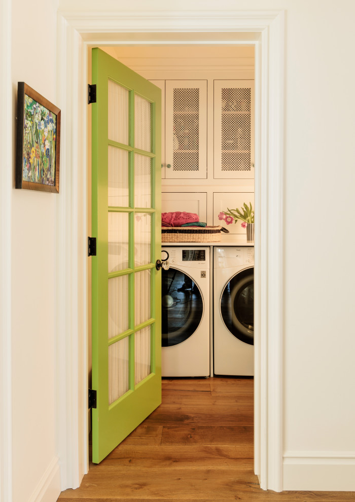 Design ideas for a small eclectic dedicated laundry room in Los Angeles with shaker cabinets.