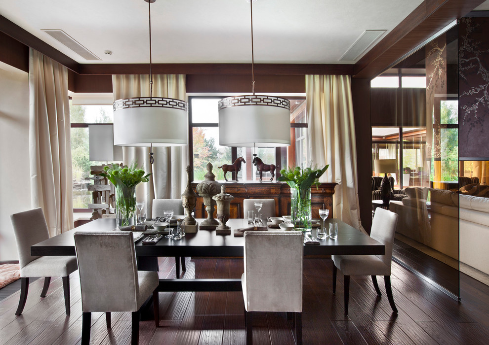 Inspiration for a mid-sized contemporary dining room in Moscow with dark hardwood floors.