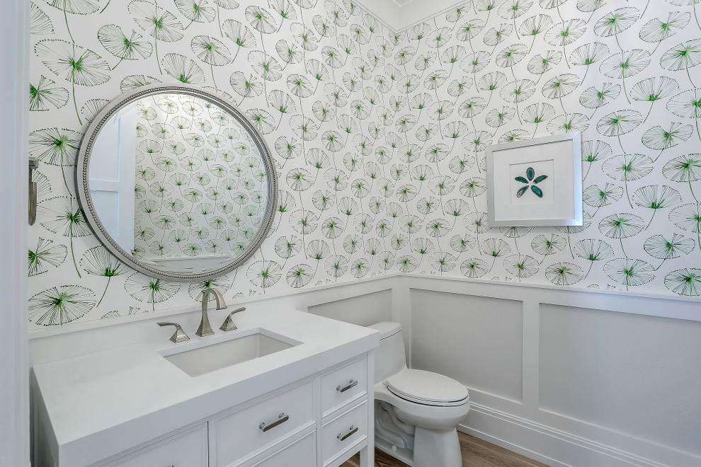 Photo of a beach style powder room in Miami.