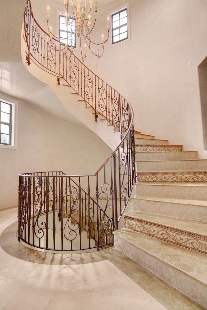 Photo of a mediterranean spiral staircase in Tampa.