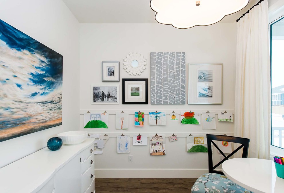Design ideas for a transitional gender-neutral kids' room in Other with white walls and dark hardwood floors.