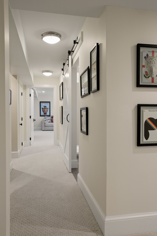 No Adults Allowed - Mid-sized country carpeted and beige floor hallway photo in Burlington with beige walls