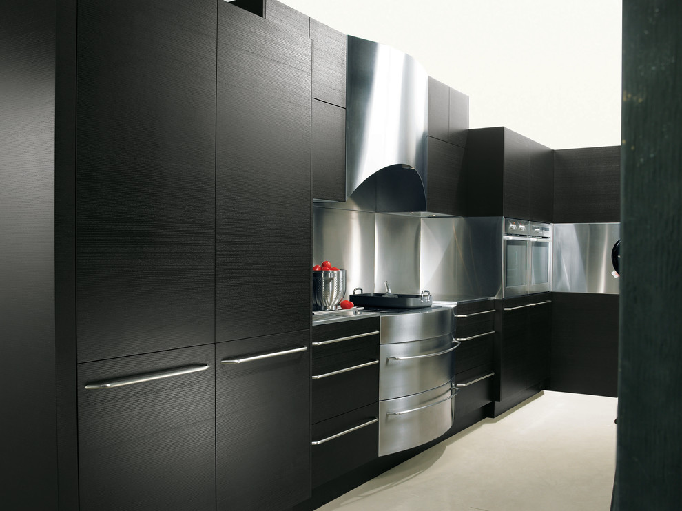 Design ideas for a large modern l-shaped separate kitchen in Dallas with flat-panel cabinets, dark wood cabinets, stainless steel benchtops, metallic splashback, metal splashback, stainless steel appliances, concrete floors and no island.