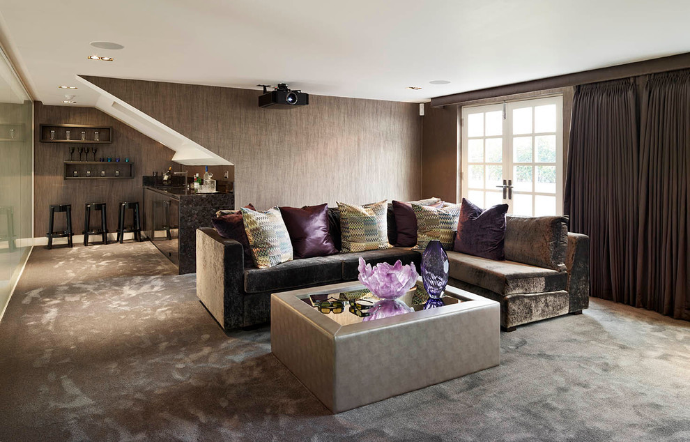 Inspiration for a contemporary family room in London with a home bar and brown floor.
