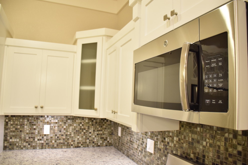 Example of a transitional home design design in Austin