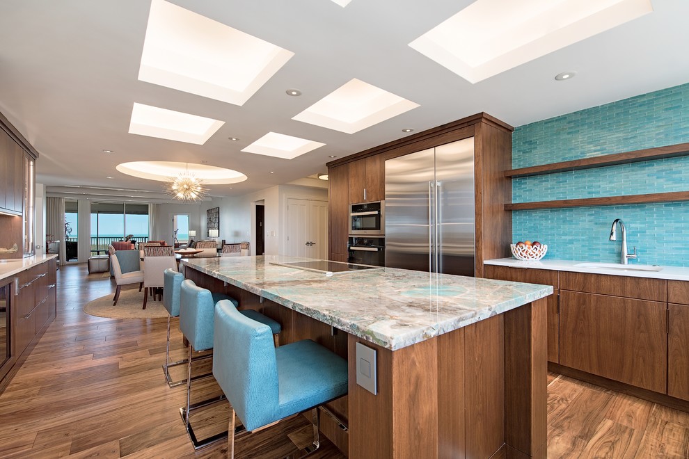 Design ideas for a contemporary open plan kitchen in Other with an undermount sink, flat-panel cabinets, dark wood cabinets, blue splashback, stainless steel appliances, dark hardwood floors, with island and multi-coloured benchtop.