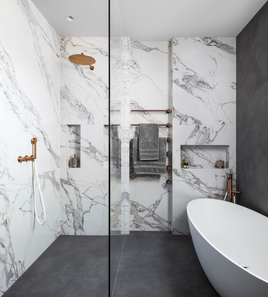 Inspiration for a mid-sized contemporary kids bathroom in London with recessed-panel cabinets, dark wood cabinets, a curbless shower, gray tile, grey walls, a drop-in sink, marble benchtops, white benchtops, a double vanity and a floating vanity.