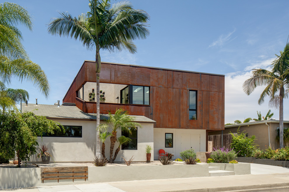 Design ideas for an urban two floor detached house in San Diego with metal cladding.
