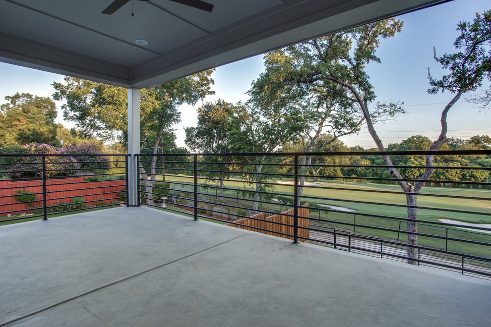 Design ideas for a large country balcony in Dallas with a roof extension.