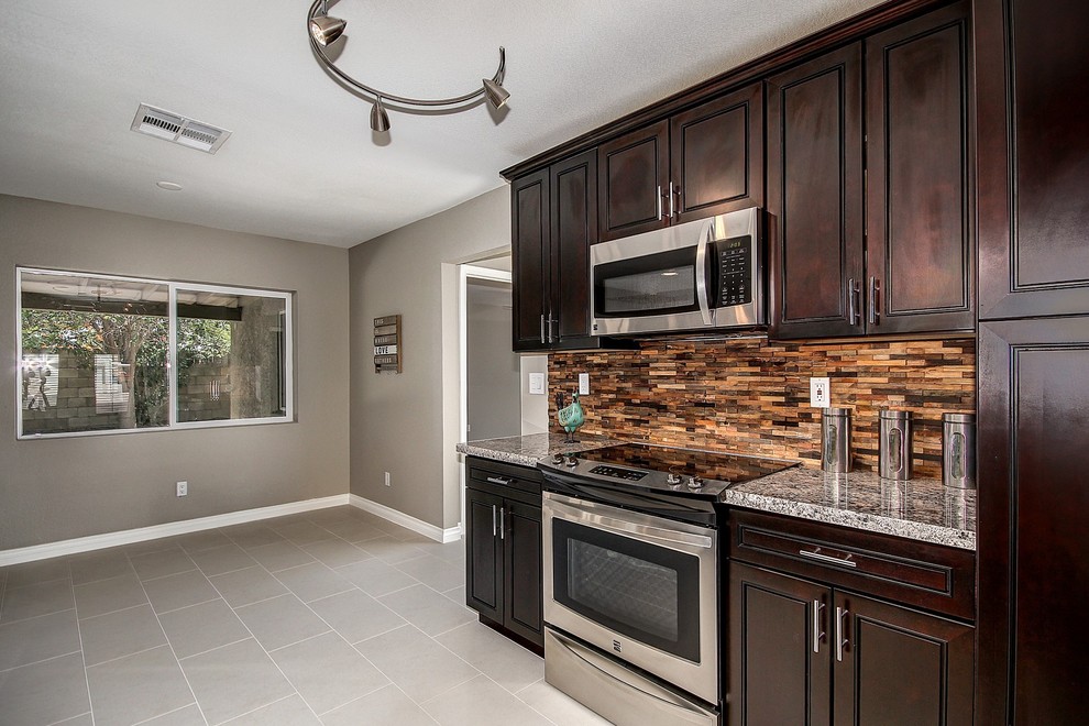 Example of a mountain style home design design in Phoenix