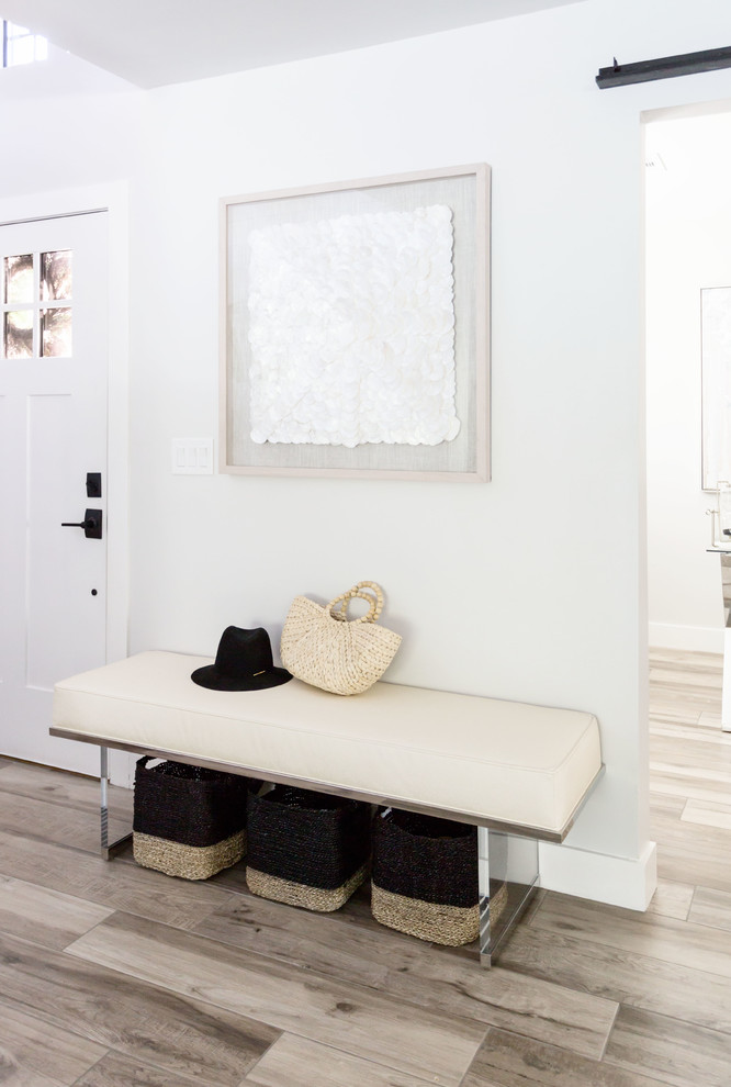 Mid-sized transitional porcelain tile and gray floor mudroom photo in Phoenix with white walls and a white front door