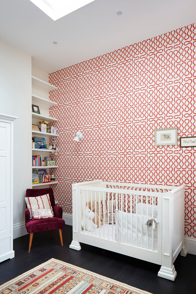Design ideas for a contemporary gender-neutral nursery in London with multi-coloured walls and black floor.
