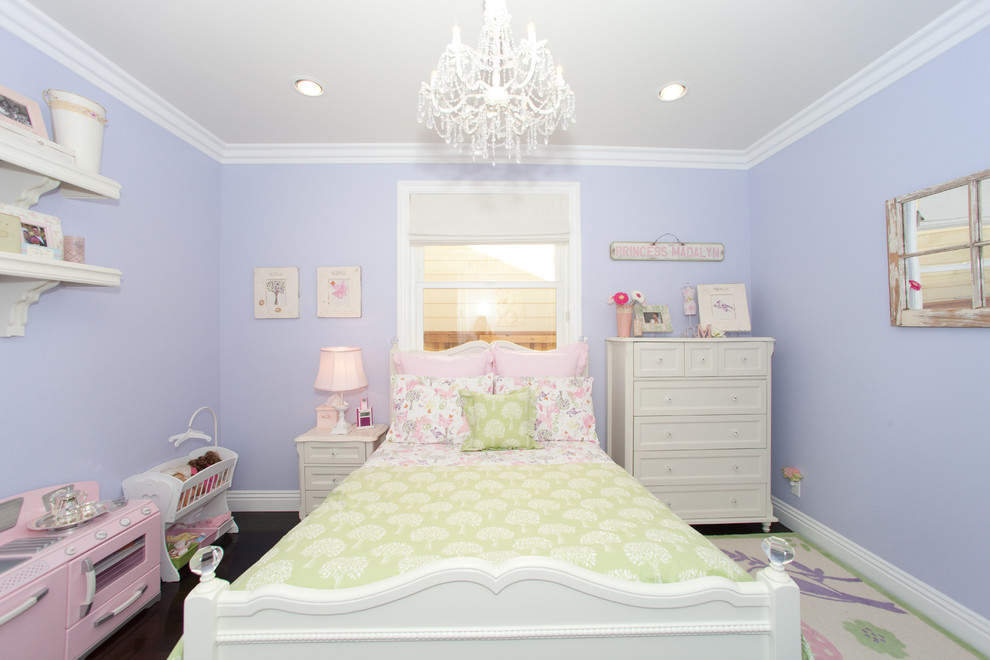 Photo of a traditional kids' room for girls in Los Angeles with purple walls.