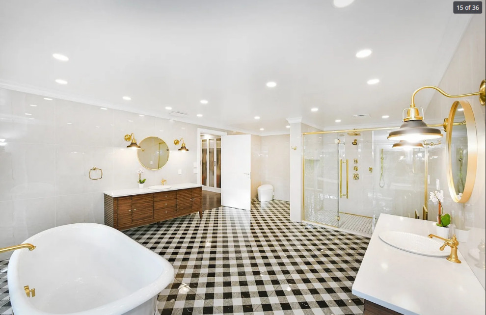 Inspiration for a huge transitional master white tile and porcelain tile porcelain tile, multicolored floor and single-sink bathroom remodel in New York with louvered cabinets, brown cabinets, a bidet, white walls, a drop-in sink, quartz countertops, a hinged shower door, white countertops and a freestanding vanity
