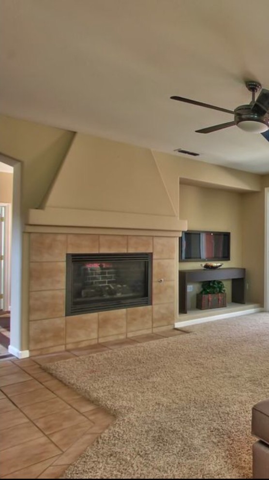 Slanted wall above fireplace