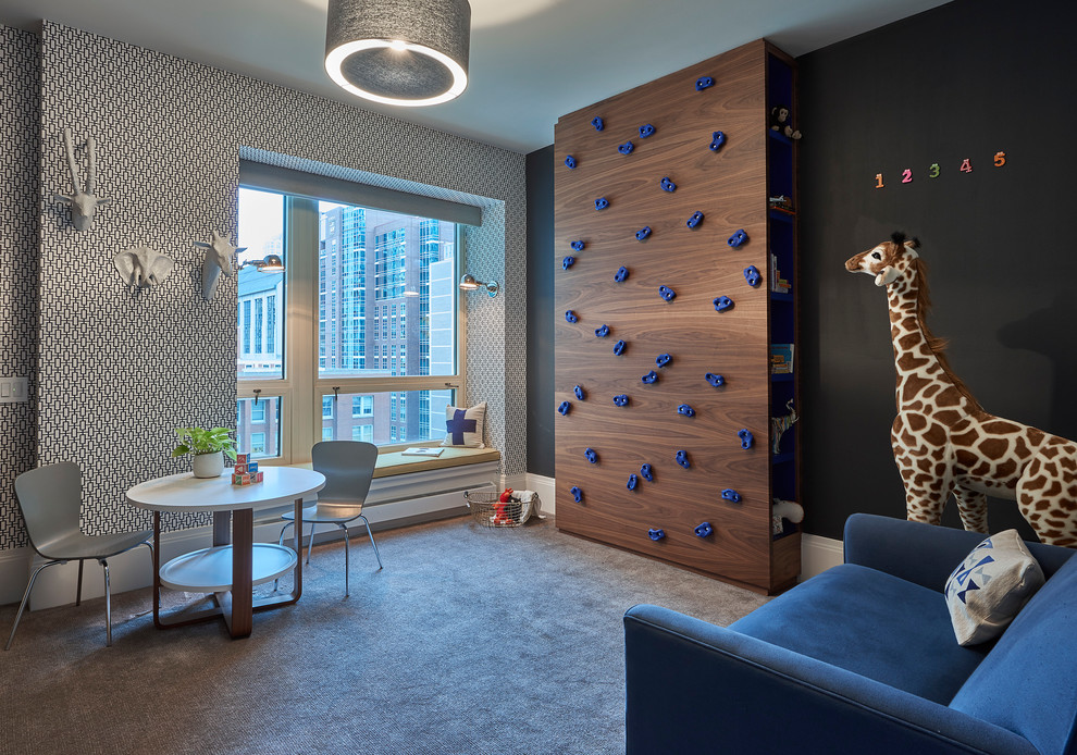 Transitional gender-neutral kids' playroom in Chicago with black walls, carpet and grey floor.