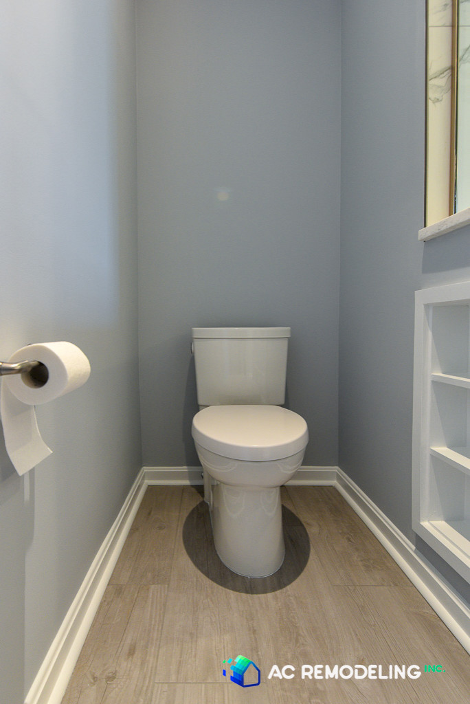 Private space for toilet and Silver Fir matte floor tile.