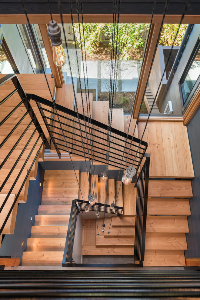 Large country wood floating staircase in San Francisco.