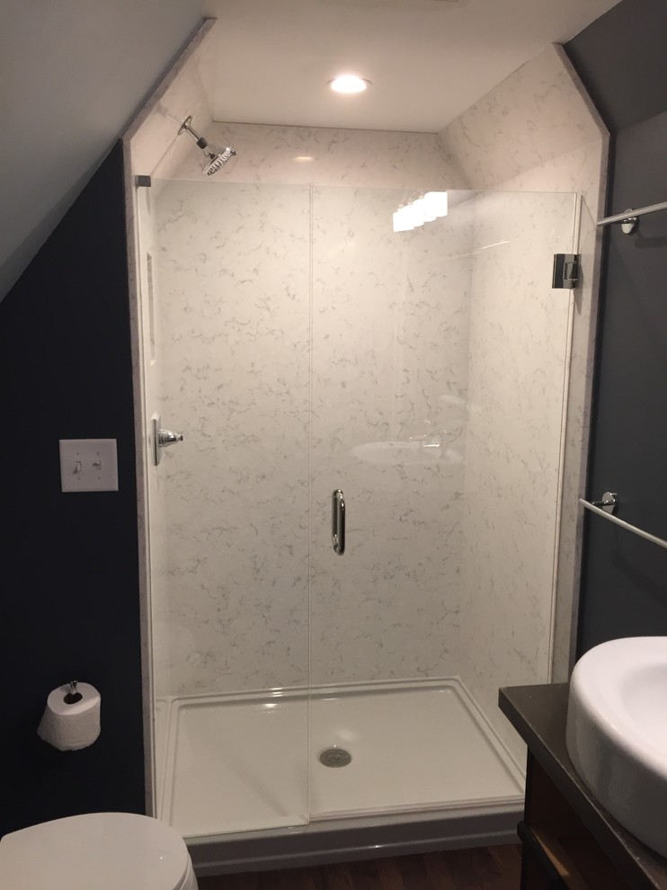 Design ideas for a small contemporary 3/4 bathroom in Atlanta with flat-panel cabinets, dark wood cabinets, an alcove shower, a two-piece toilet, white tile, marble, grey walls, dark hardwood floors, a vessel sink, wood benchtops, brown floor and a hinged shower door.