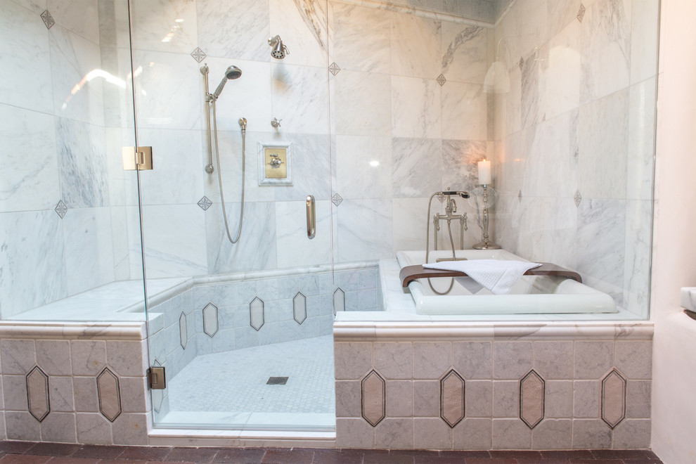 На фото: большая главная ванная комната в стиле неоклассика (современная классика) с накладной ванной, душем над ванной, серой плиткой, каменной плиткой, серыми стенами и кирпичным полом