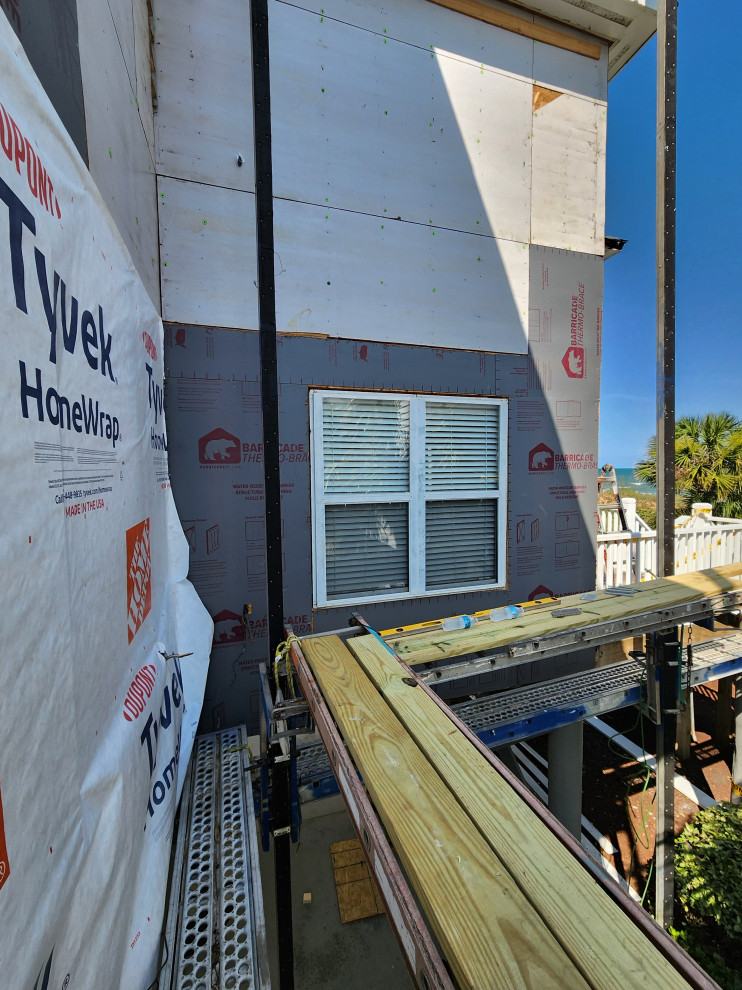 Exterior remodel / Windows / cider siding / paint