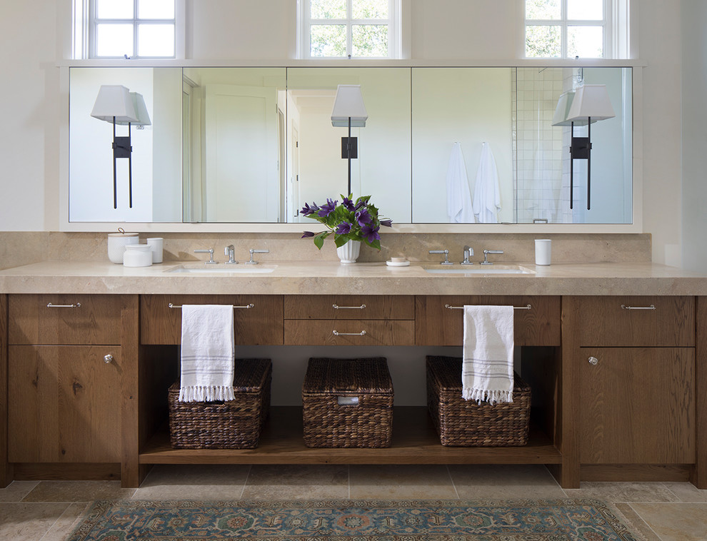 This is an example of a transitional master bathroom in San Francisco with flat-panel cabinets, dark wood cabinets, white walls, an undermount sink and beige floor.