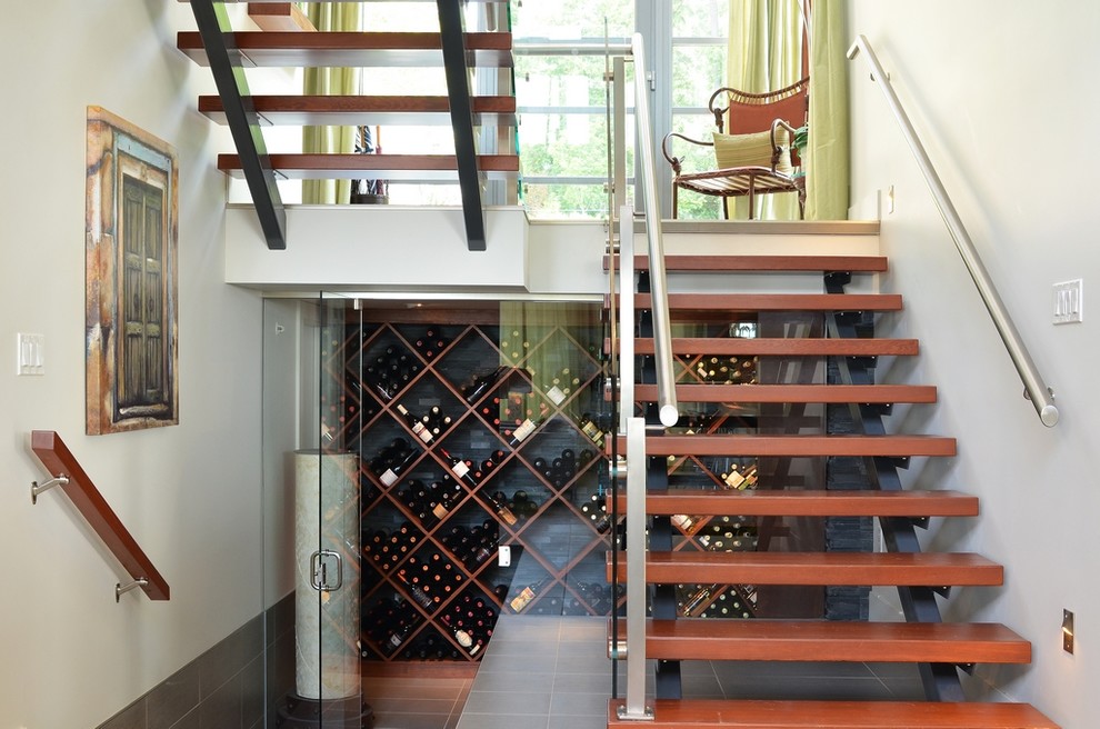 Design ideas for a contemporary wine cellar in Vancouver with diamond bins.