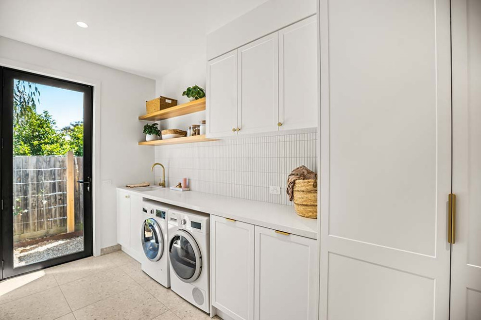 Inspiration for a coastal laundry room remodel in Melbourne