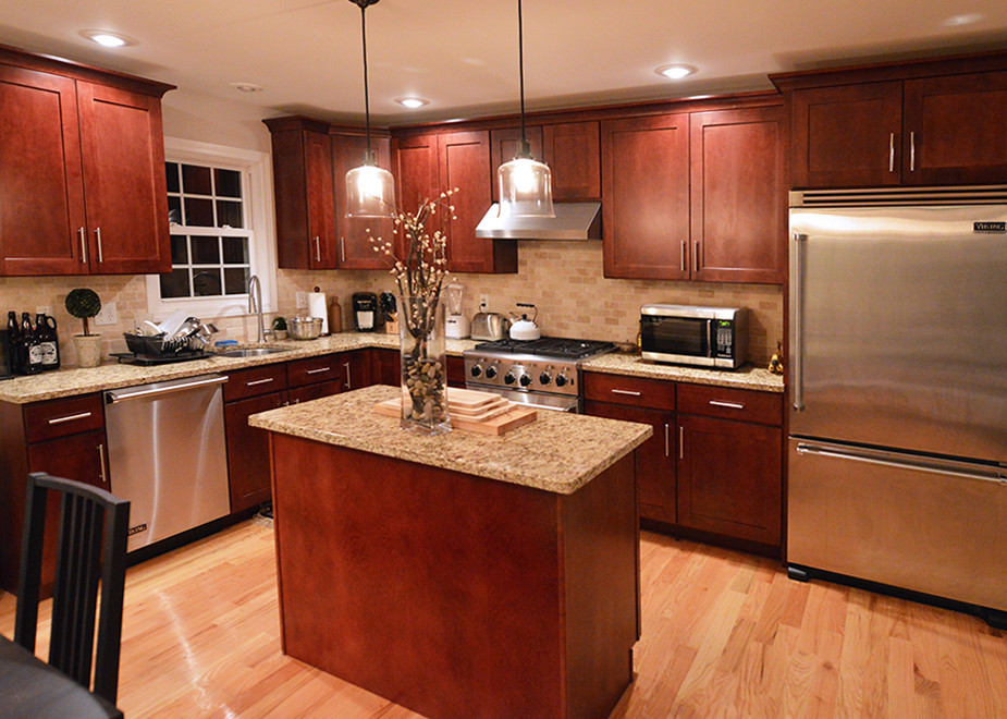 Example of a transitional kitchen design in New York