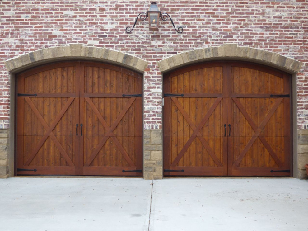 Garage - rustic two-car garage idea in Atlanta