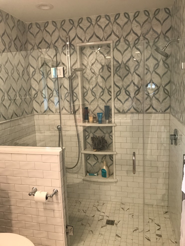 Example of a mid-sized transitional master white tile and stone tile porcelain tile and white floor doorless shower design in Chicago with shaker cabinets, white cabinets, a one-piece toilet, white walls, an undermount sink, quartz countertops and a hinged shower door